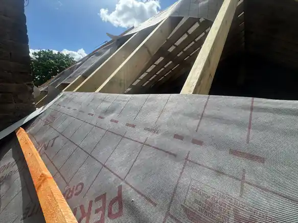 New rafters with breathable membrane and the first batten fixed