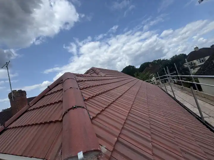 New red tile roof with the ridge and hips finished