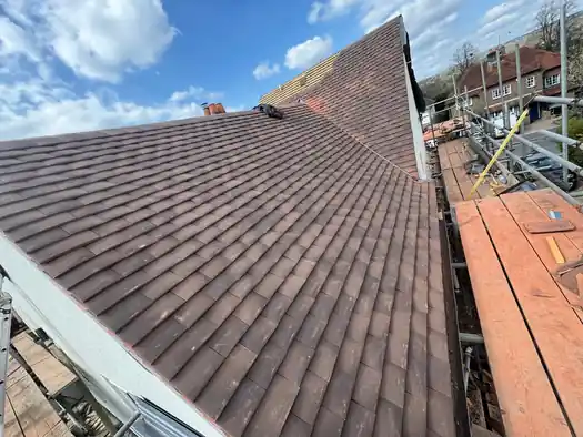 Finished plain tile slope on the Farnham roof, seen from the scaffold